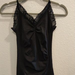 Fitted black shell with lace neckline